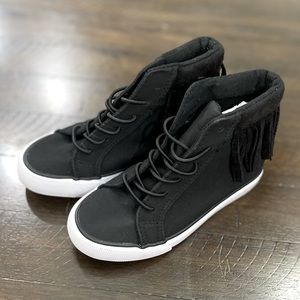 Black fringe sneakers